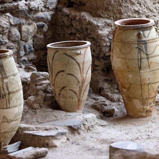 Recovered-ancient-pottery-in-prehistoric-town-of-Akrotiri,-excavation-site-of-a-Minoan-Bronze-Age-settlement-on-the-Greek-island-of-Santorini